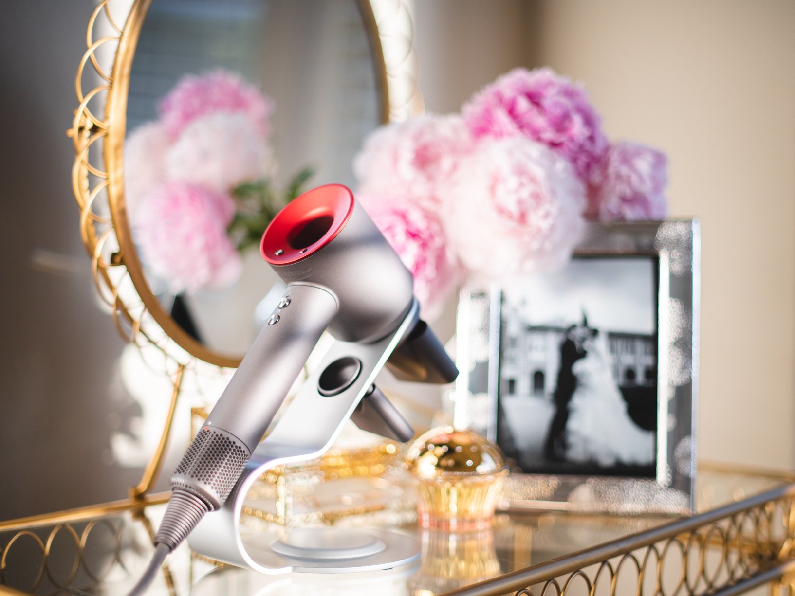 Dyson Hairdryer with a stand on vanity table